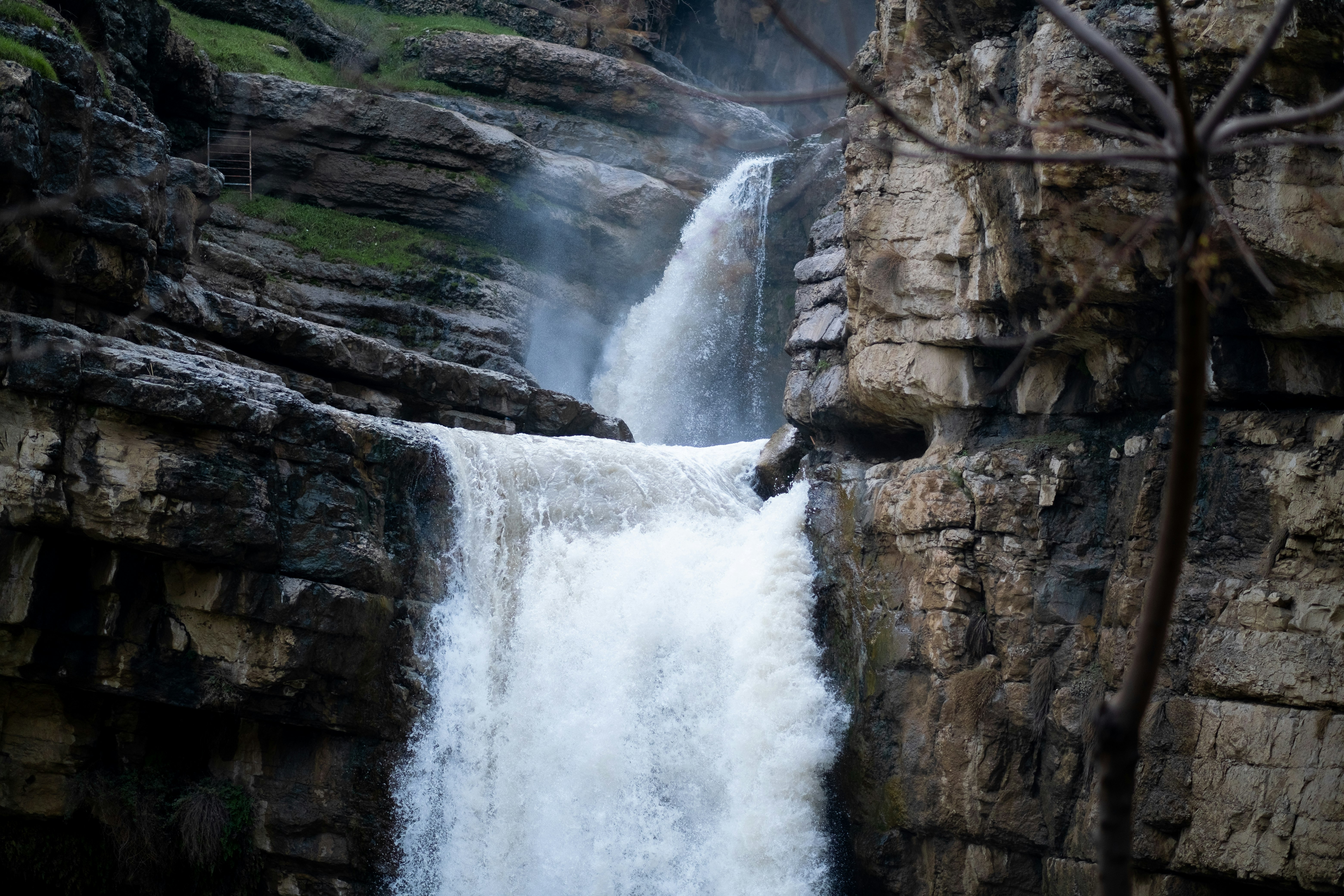 water falls on rocky mountain